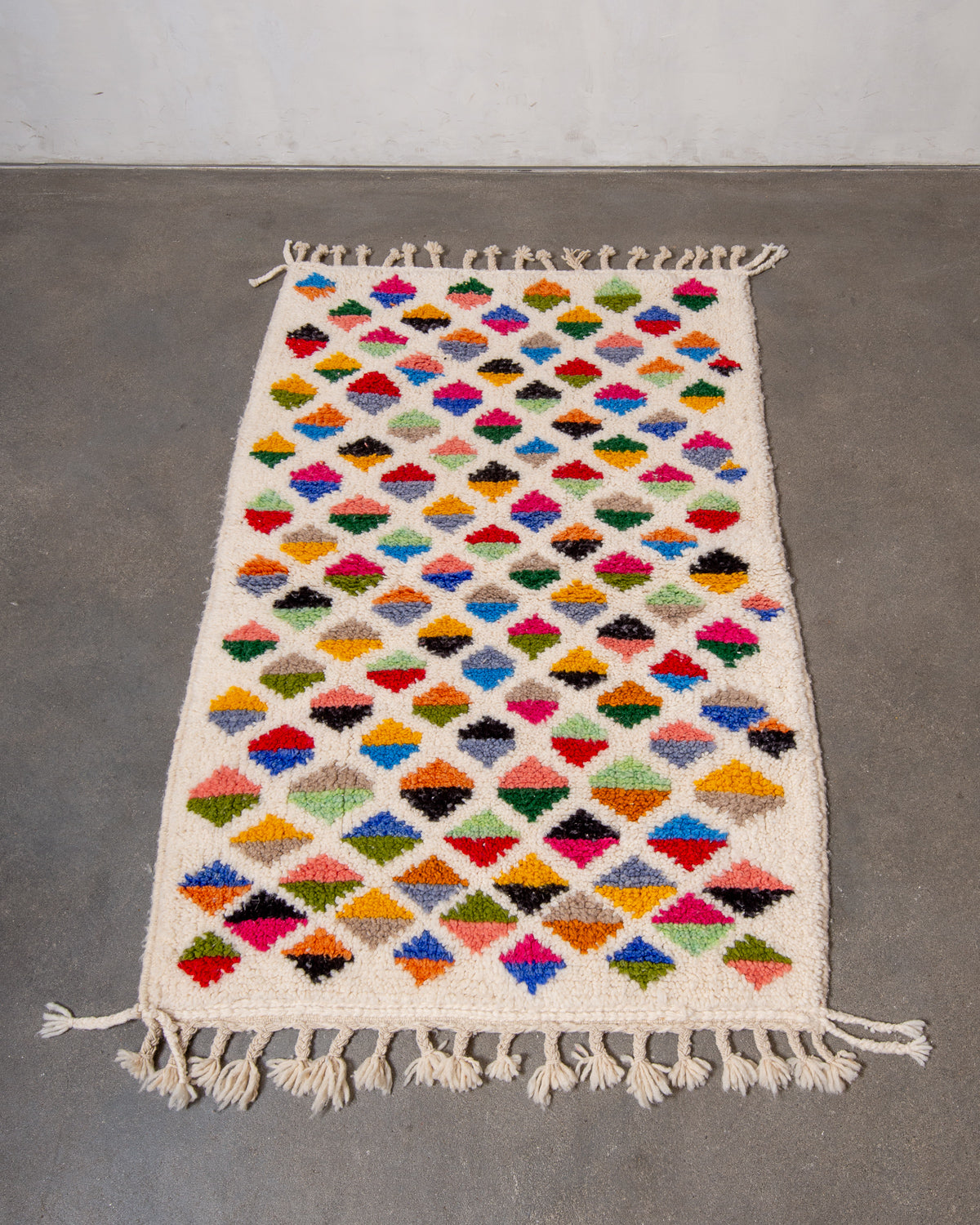 Modern, designer, handcrafted Berber rug from Morocco. Beniourain carpet with beautiful colours and patterns and fluffy wool texture.